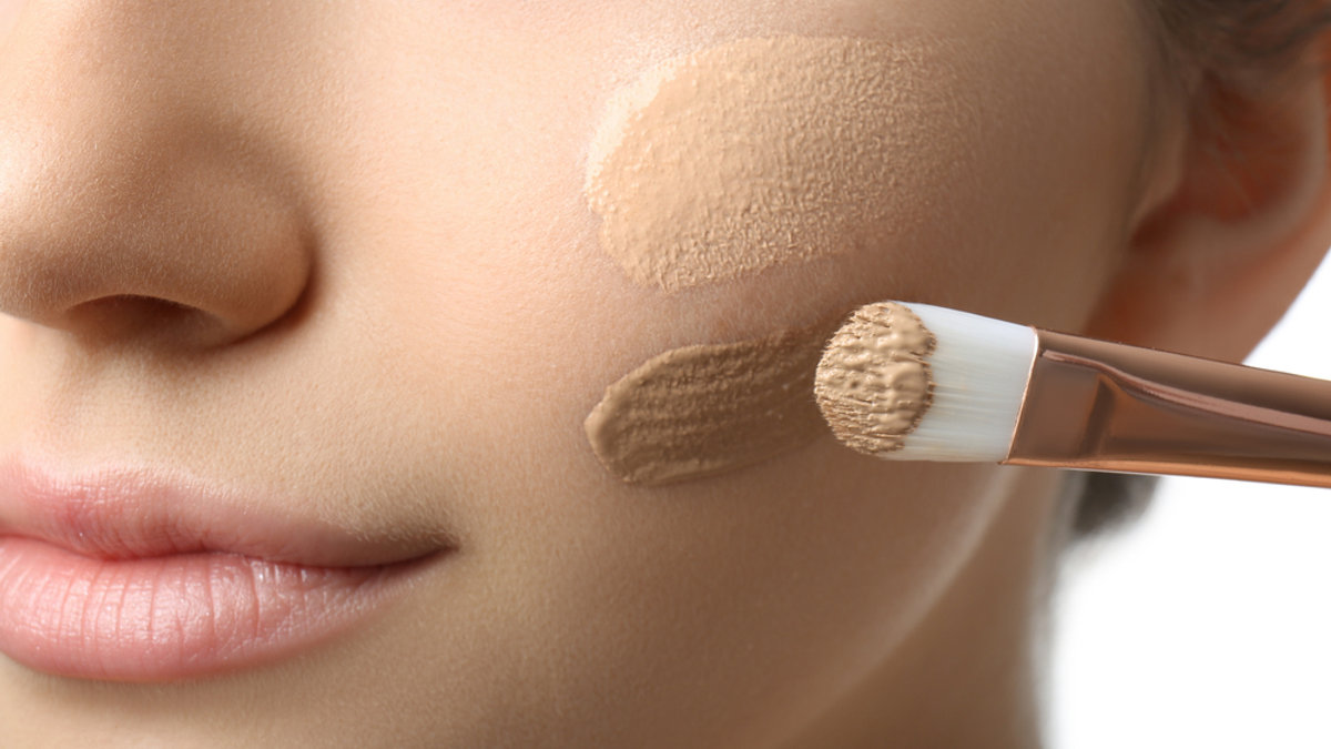 Woman doing makeup