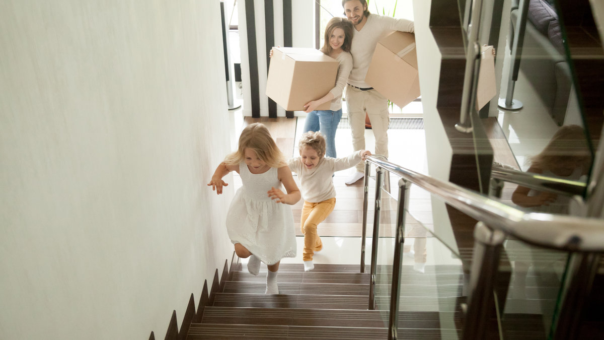 parenting with kids running upstairs during move