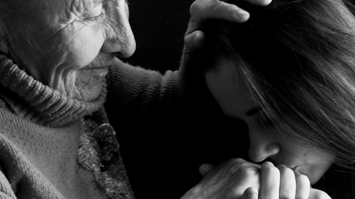 Grandmother blesses granddaughter