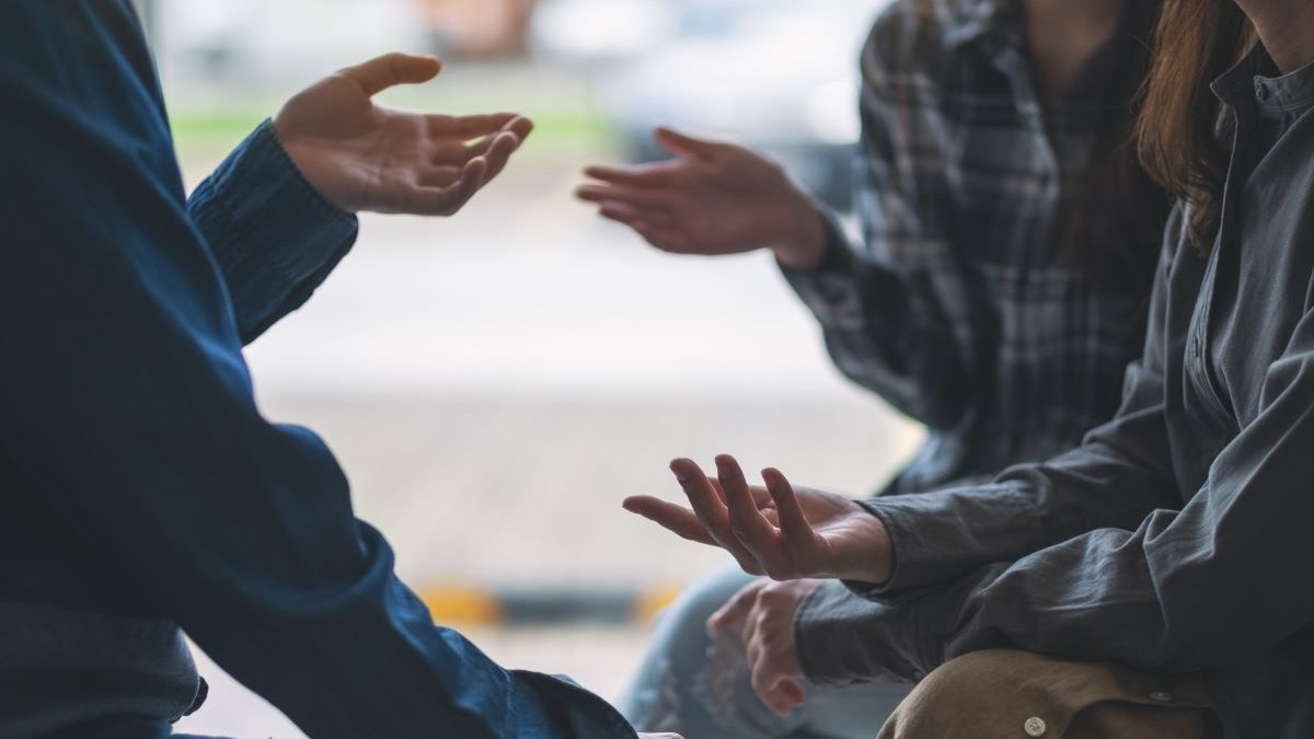 People sitting and talking together