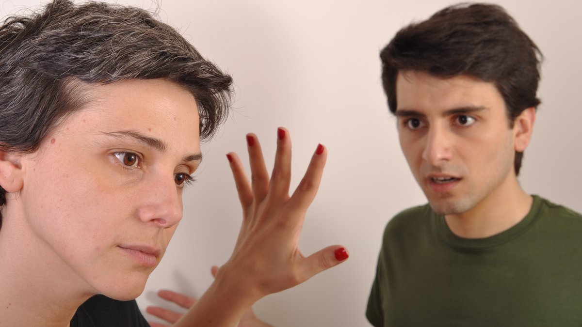 angry brother yelling at her older sister