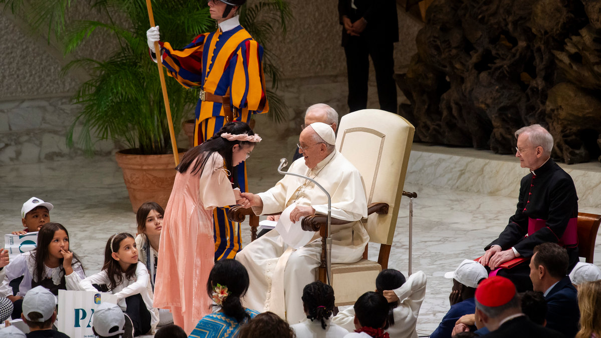 Pope Francis attends a meeting with children from all over the world