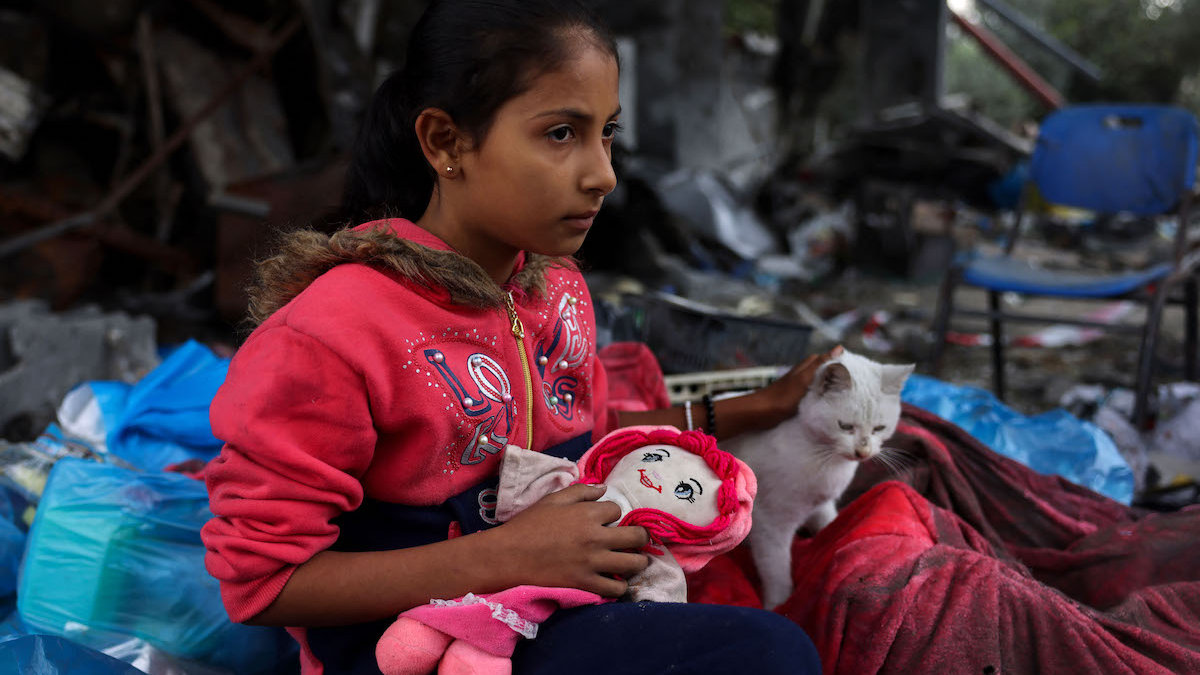 Palestinian-girl-amid-ruins.jpg
