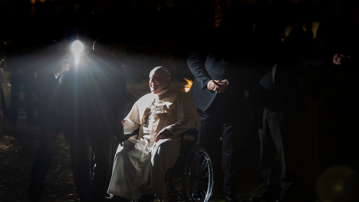 Pope Francis stops in front a nativity scene in St. Peter's Square after presiding over the first Vespers and the 'Te Deum'