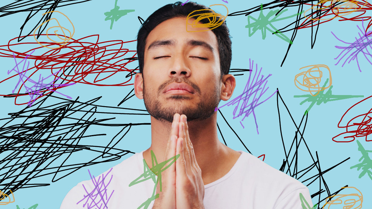 Man praying amid distractions