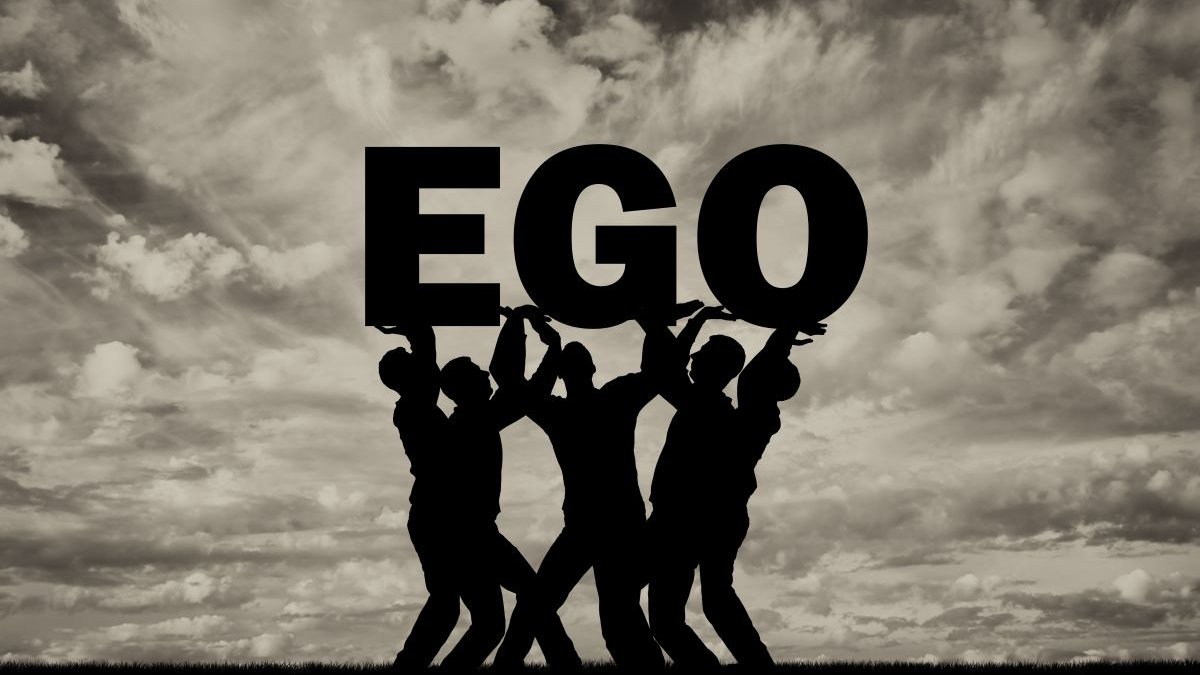 The-silhouette-of-a-selfish-crowd-holds-the-word-ego-shutterstock_1124268737.jpg