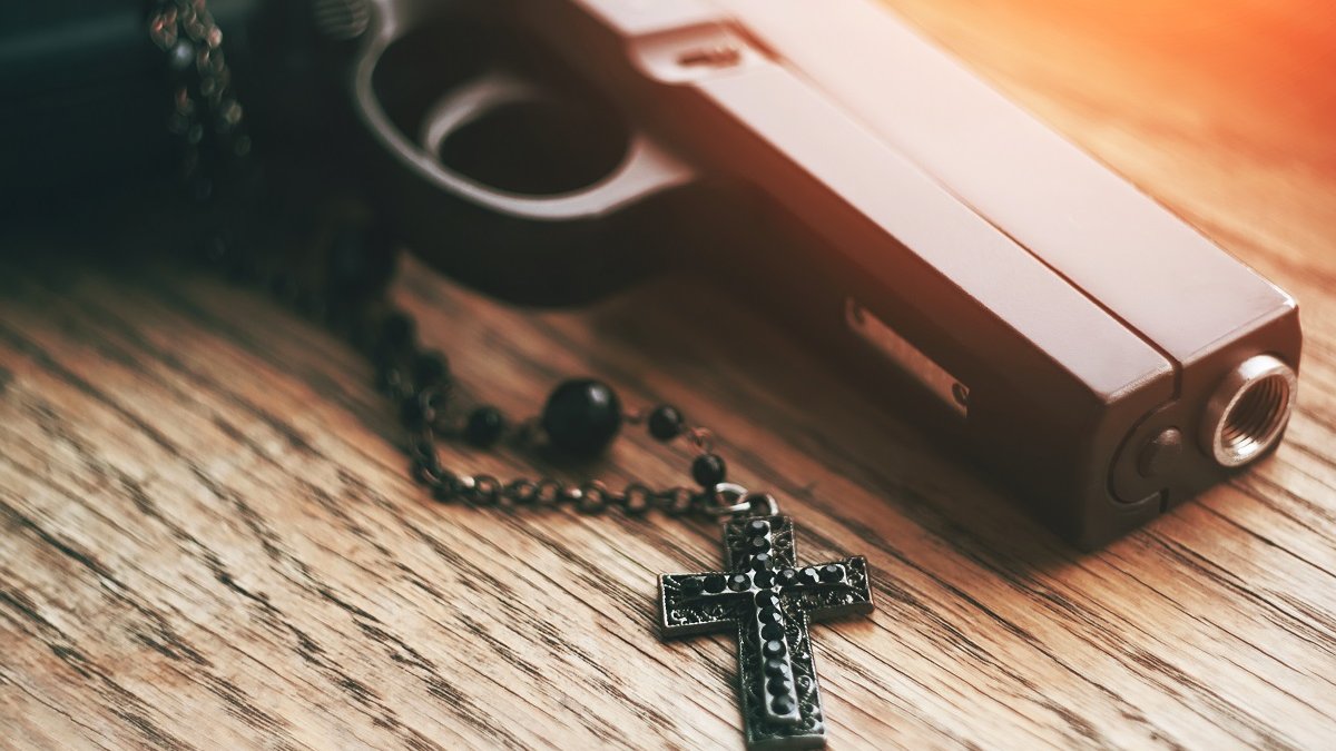 Gun and rosary