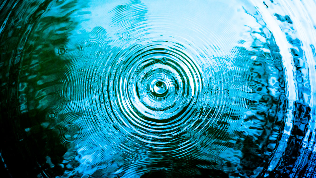 Top-view-Closeup-blue-water-rings-Circle-reflections-in-pool.jpeg