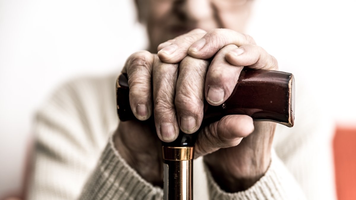 Old woman with cane