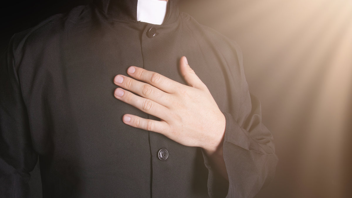 Praying,Priest