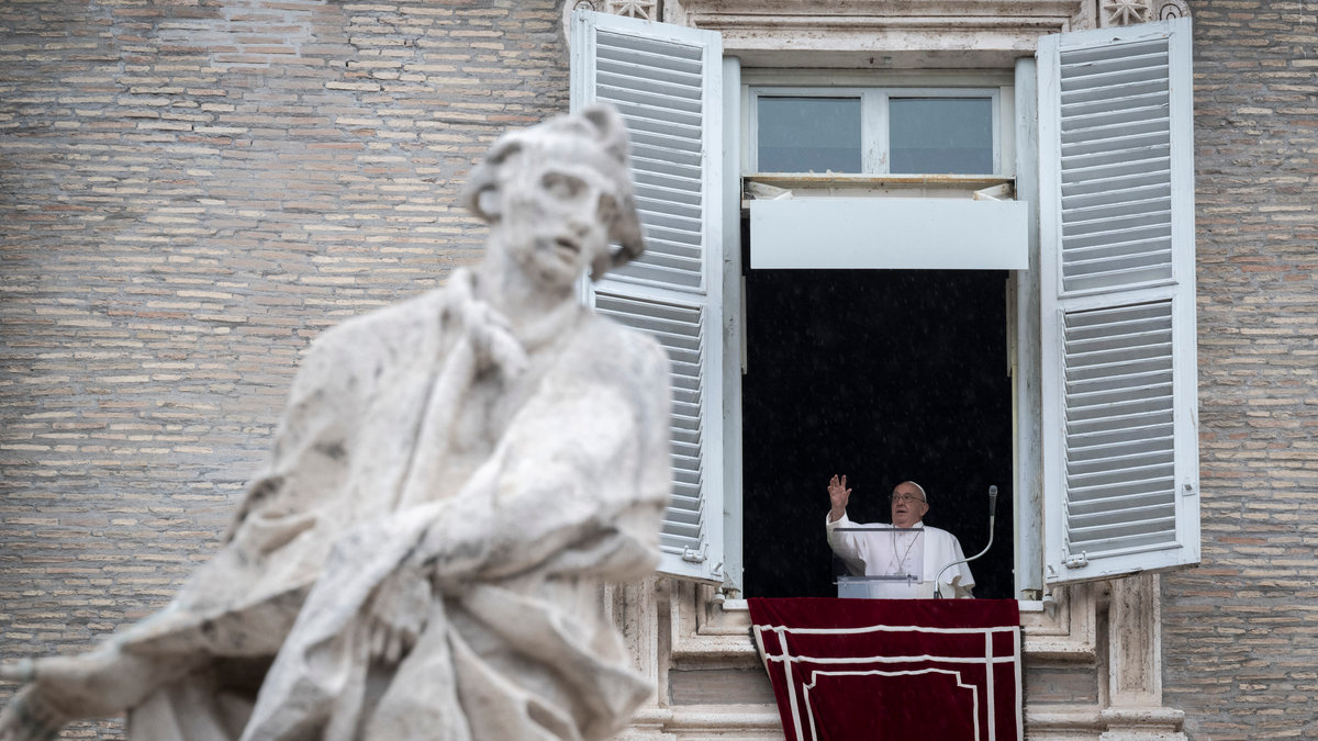 Pope Francis addresses the crowd from the window of the apostolic palace overlooking St. Peter's square during the Regina Coeli prayer on May 19, 2024 in The Vatican.