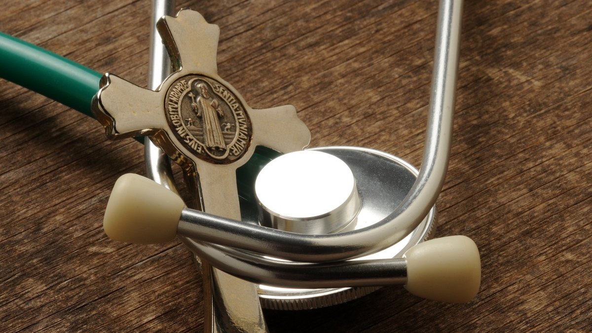 Cross with stethoscope