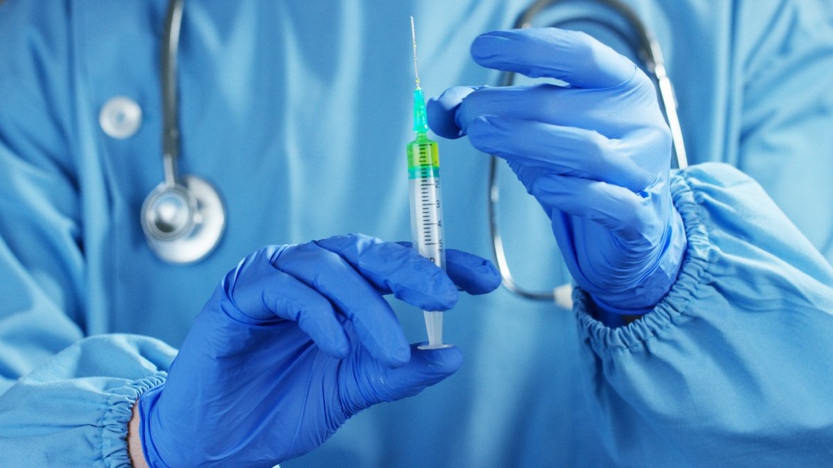 Doctor with needle