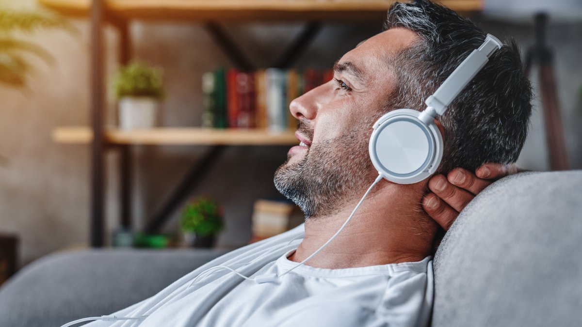 man-headphones-podcast-