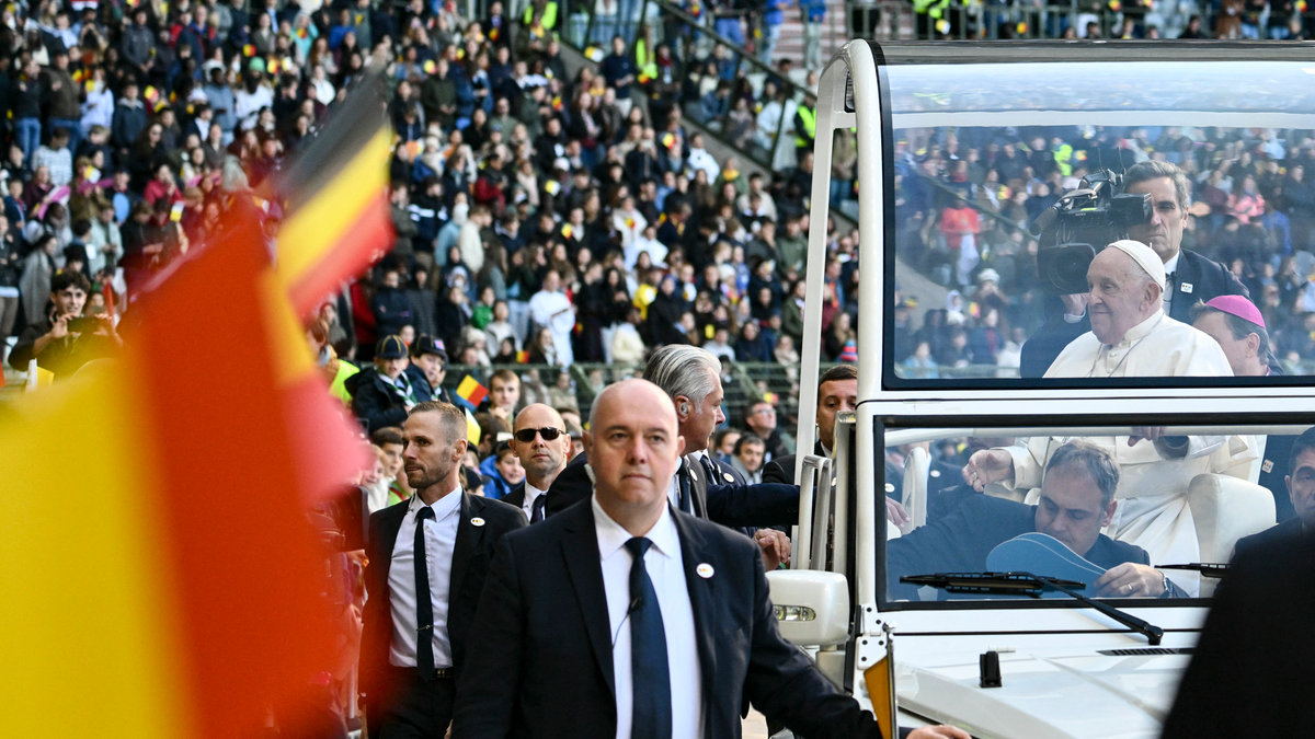 Pope Francis looks on from the popemobile as he arrives at King Badouin Stadium to hold a holy mass, in Brussels on September 29, 2024. The pope is on a four-day apostolic journey to Luxembourg and Belgium.