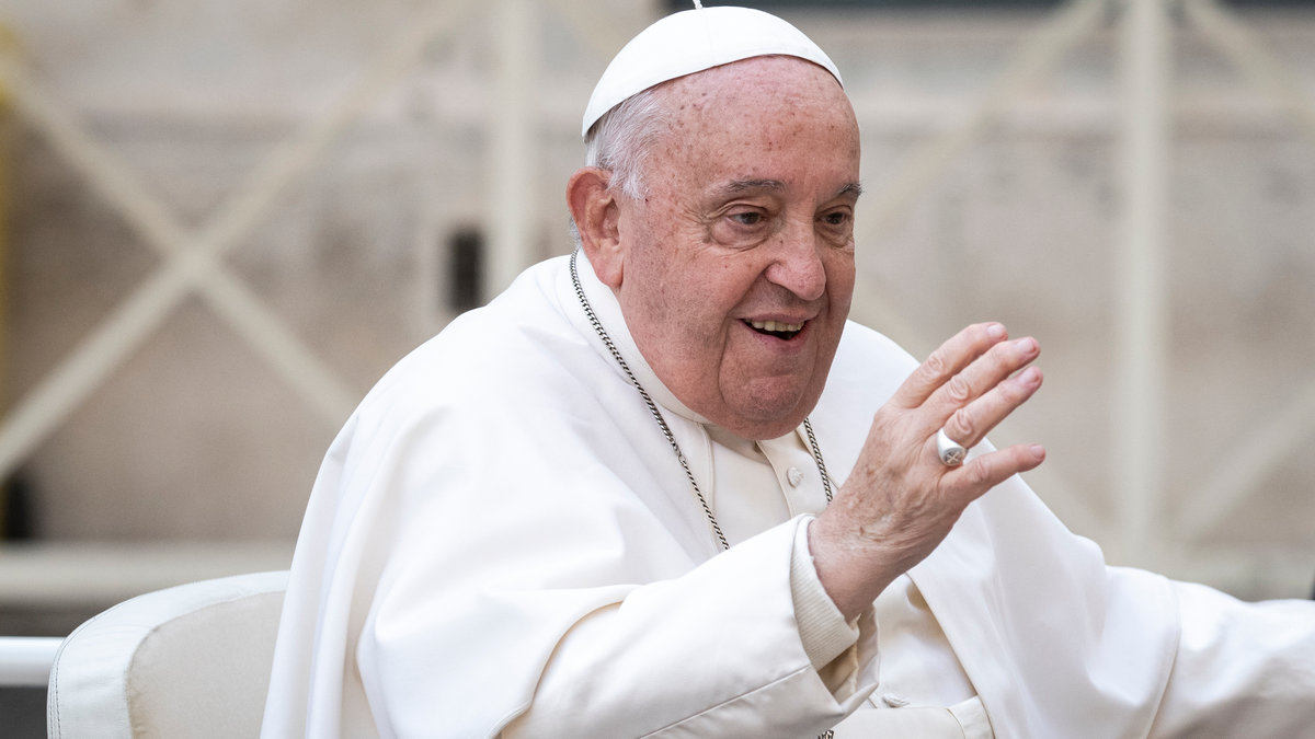 Pope Francis sits on the popemobile at the end of the weekly general audience at St Peter's Square in The Vatican on November 27, 2024.