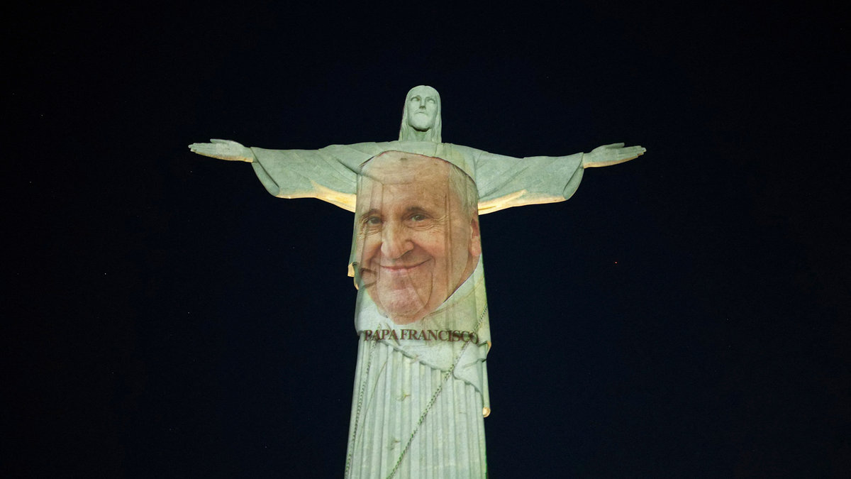 A picture of Pope Francis is projected on the Christ The Redeemer statue to launch his new book in Rio de Janeiro, Brazil