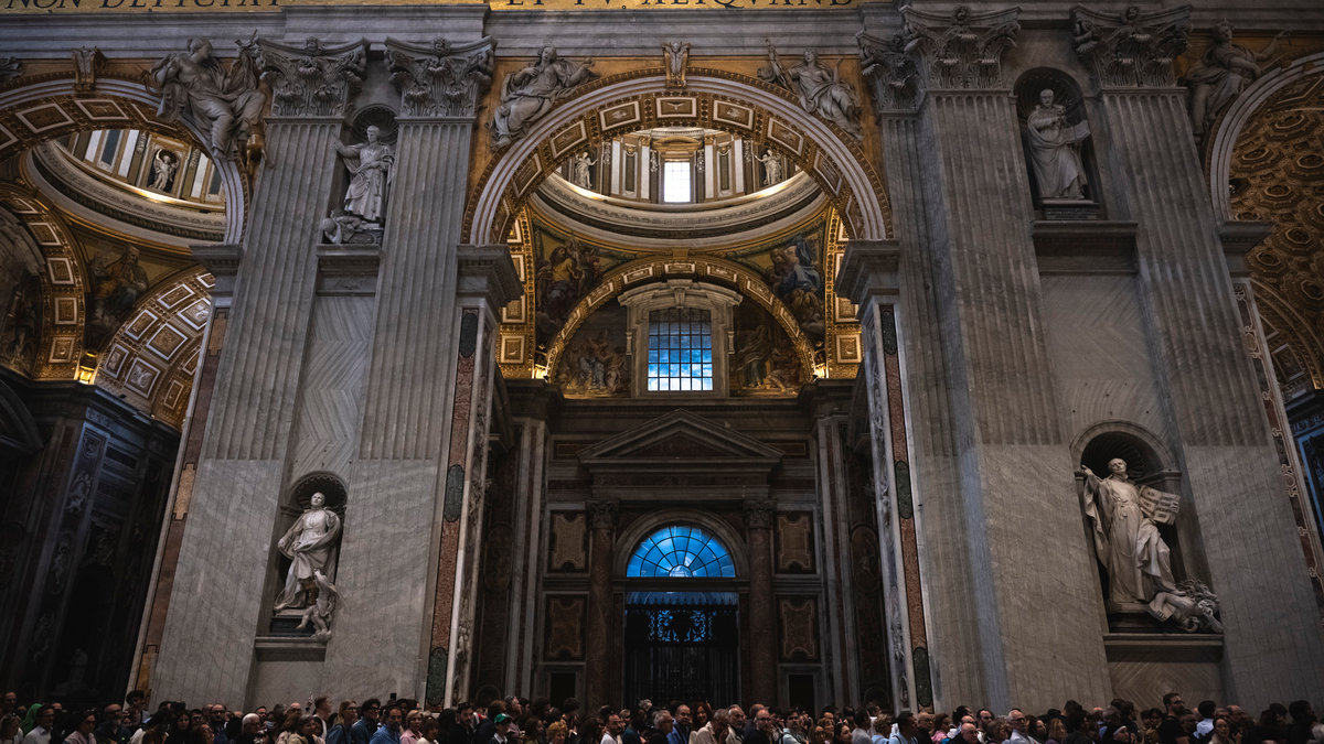 People stay in a line to pay respect to coffin with body of Pope Francis displayed at Saint Peter's Basilica in Vatican on April 23, 2025