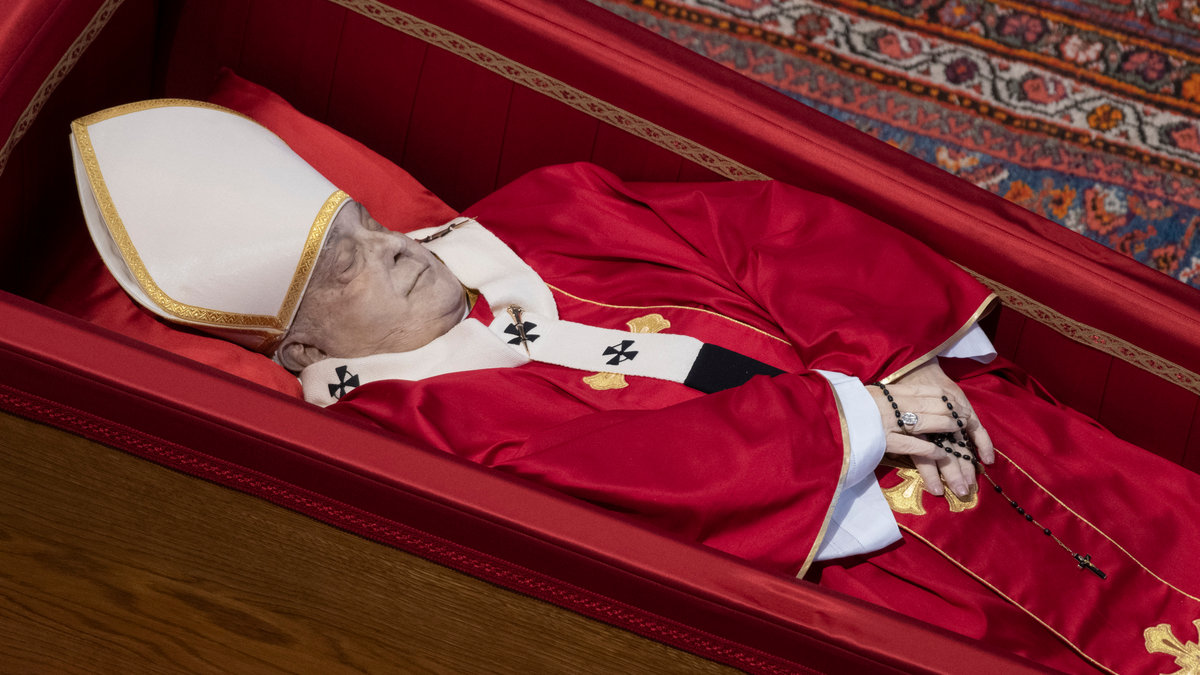 coffin of the late Pope Francis inside St Peter's Basilica as it is transported in a procession from the chapel of Santa Marta to St Peter's Basilica, following the Pope's death, in the Vatican on April 23, 2025.