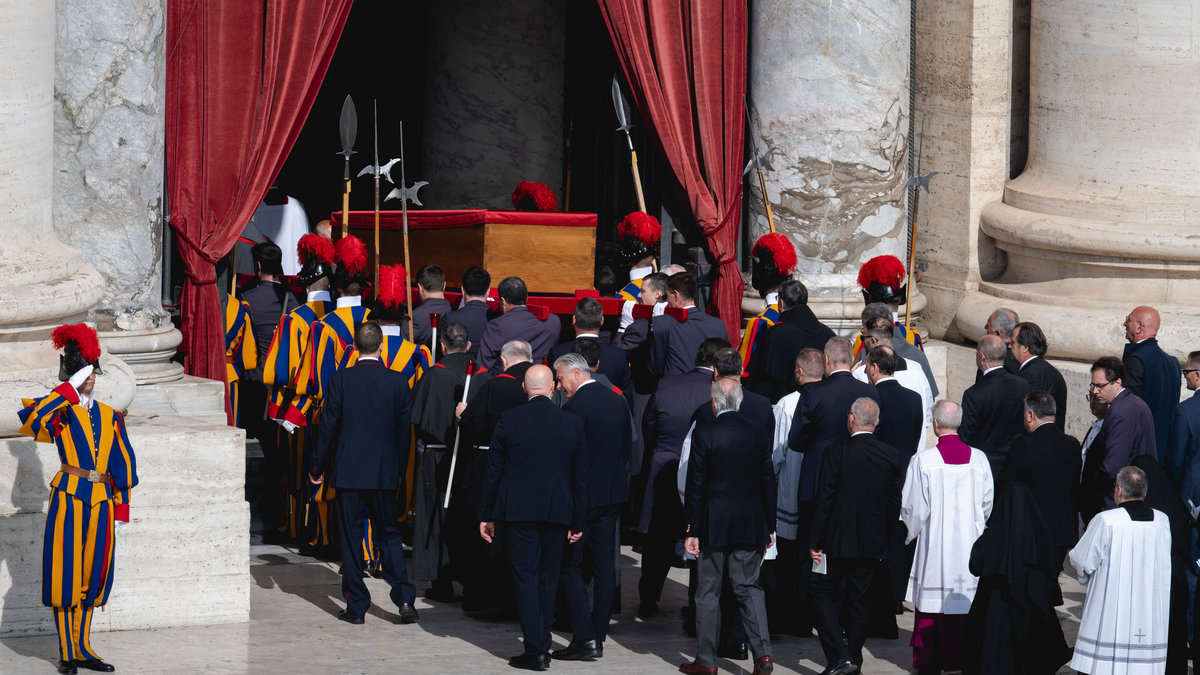 Pallbearers carry the coffin of the late Pope from the chapel of Santa Marta to St. Peter's Basilica in the Vatican on April 23, 2025.