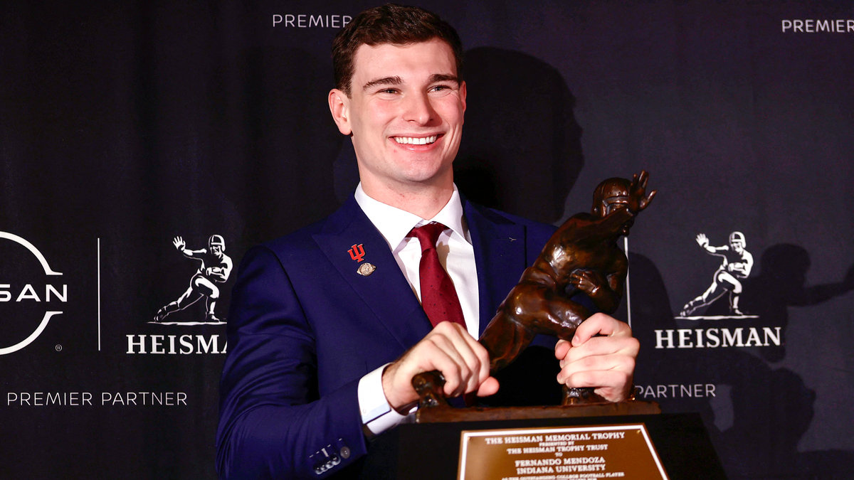 Fernando Mendoza with Heisman trophy