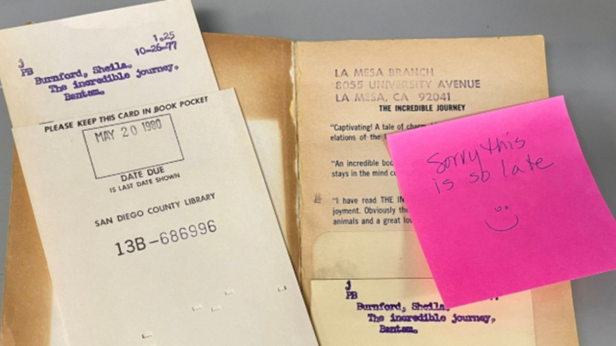 Library book and sticky note apology