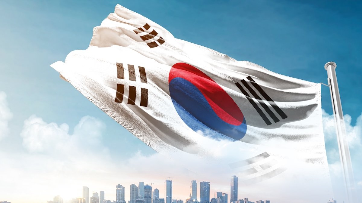 South Korea flag over skyline