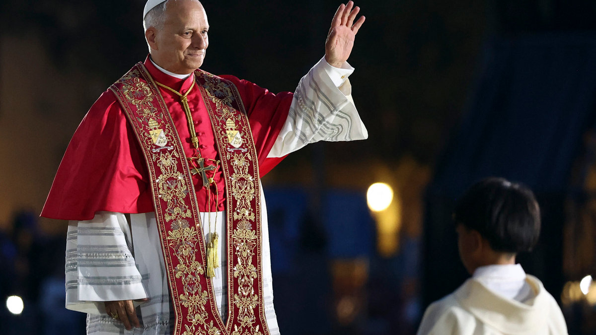Pope Leo XIV wave to people prior to inaugurating the Jesus Christ tower of the Sagrada Familia Basilica in Barcelona, on June 10, 2026
