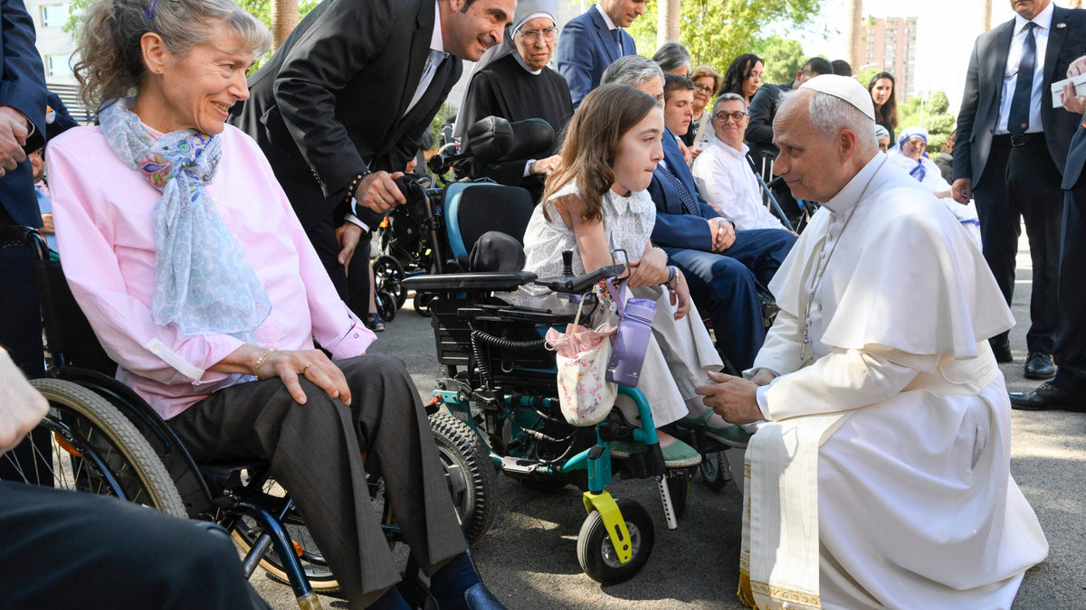 Pope Leo XIV speaking with a group of disabled people and caregivers in Madrid
