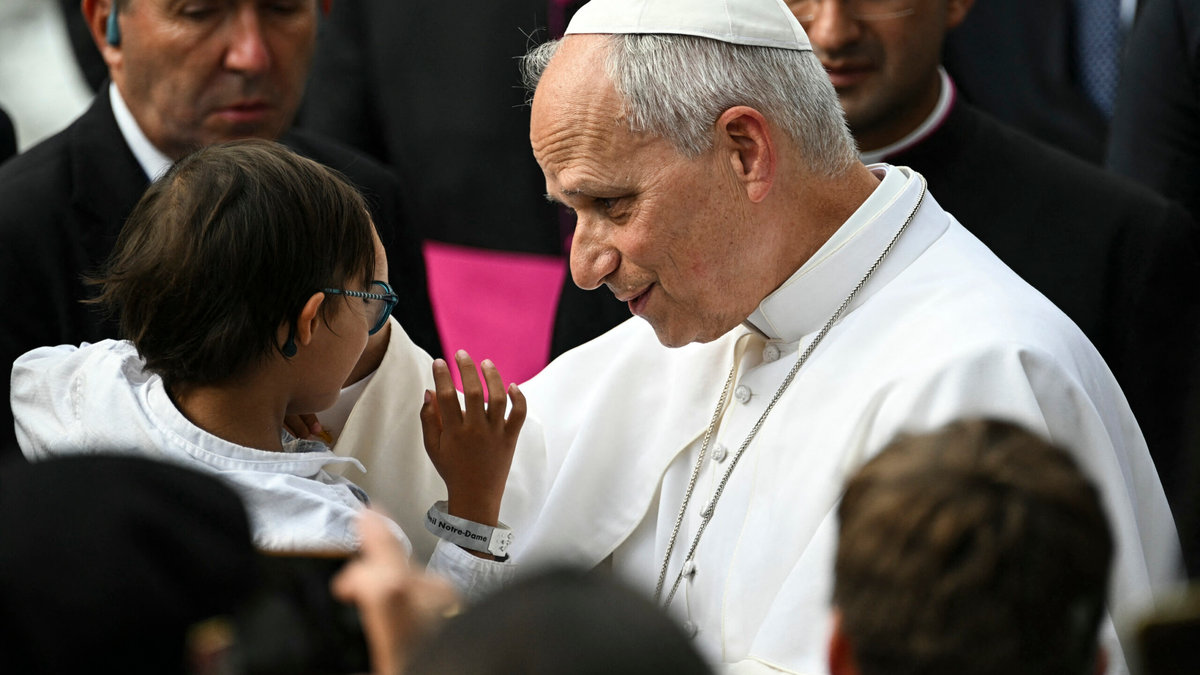 pope-leo-xiv-blesses-child-accueil-notre-dame-lourdes-france-september-27-2026