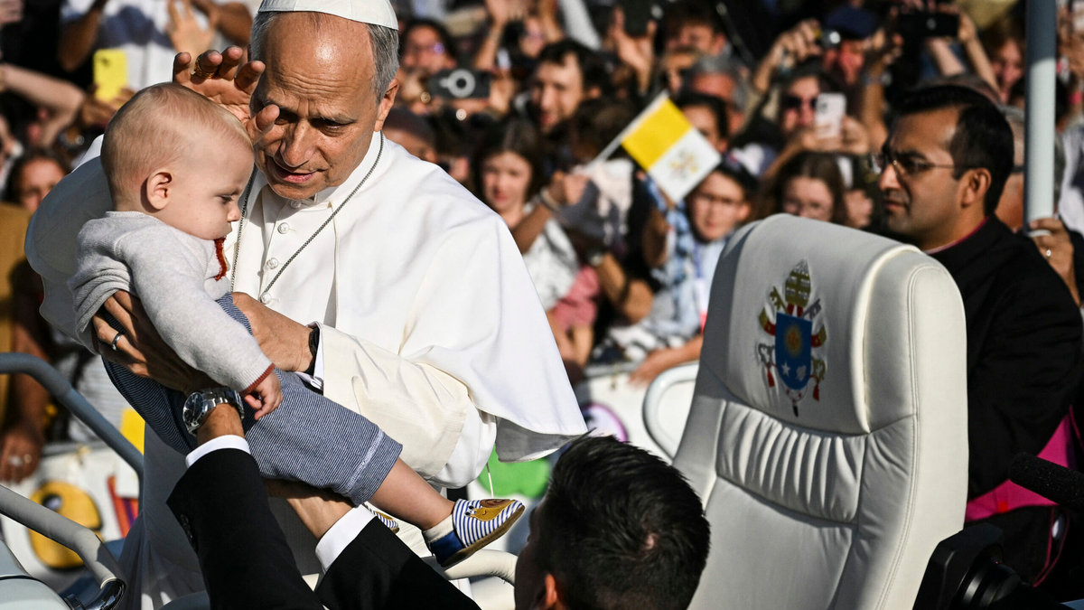 pope-leo-xiv-blesses-child-papamobile-arrives-mass-prairie-shrine-our-lady-lourdes-france-september-27-2026