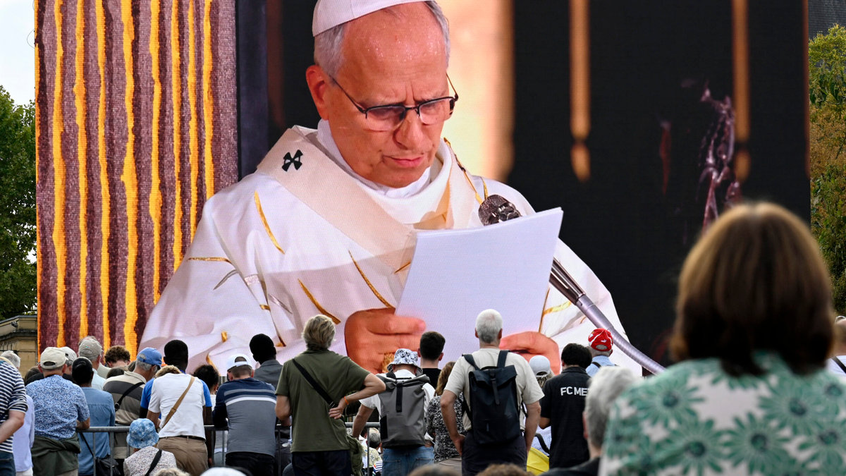 worshippers-watch-giant-screen-pope-leo-xiv-mass-saint-etienne-metz-cathedral-france-september-28-2026