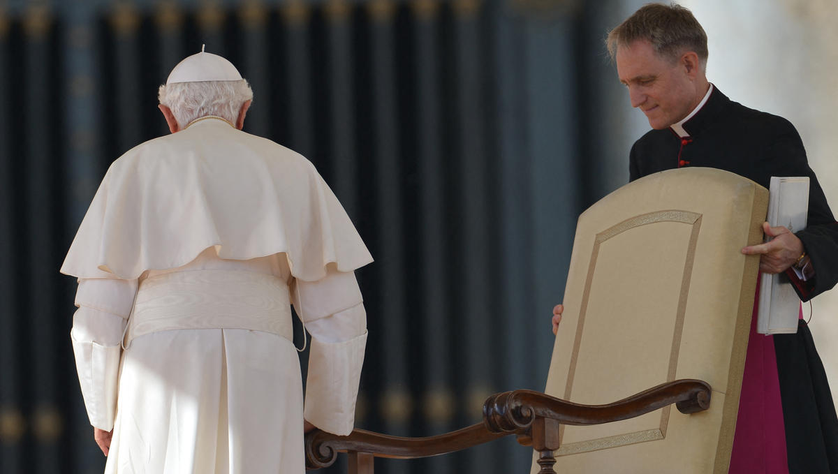 Pope-Benedict-XVI-is-assisted-by-his-secretary-Georg-Gaenswein-AFP
