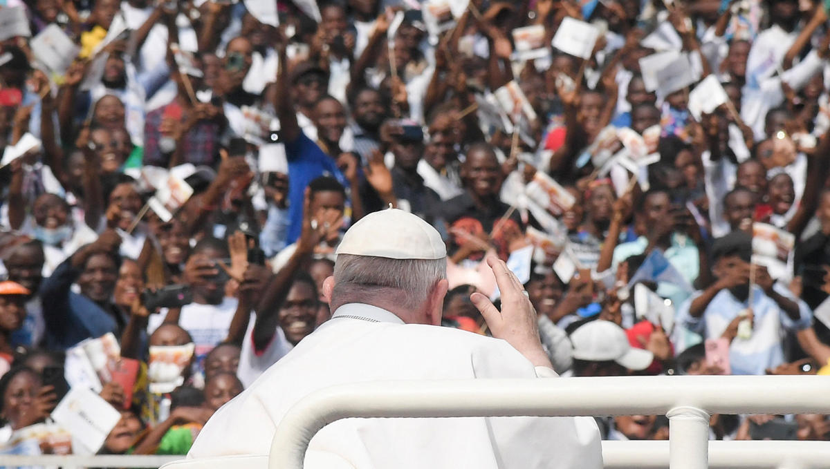 Pope-Francis-waves-as-he-arrives-by-popemobile-for-a-meeting-with-young-people-and-catechists-at-Martyrs-Stadium-in-Kinshasa-AFP