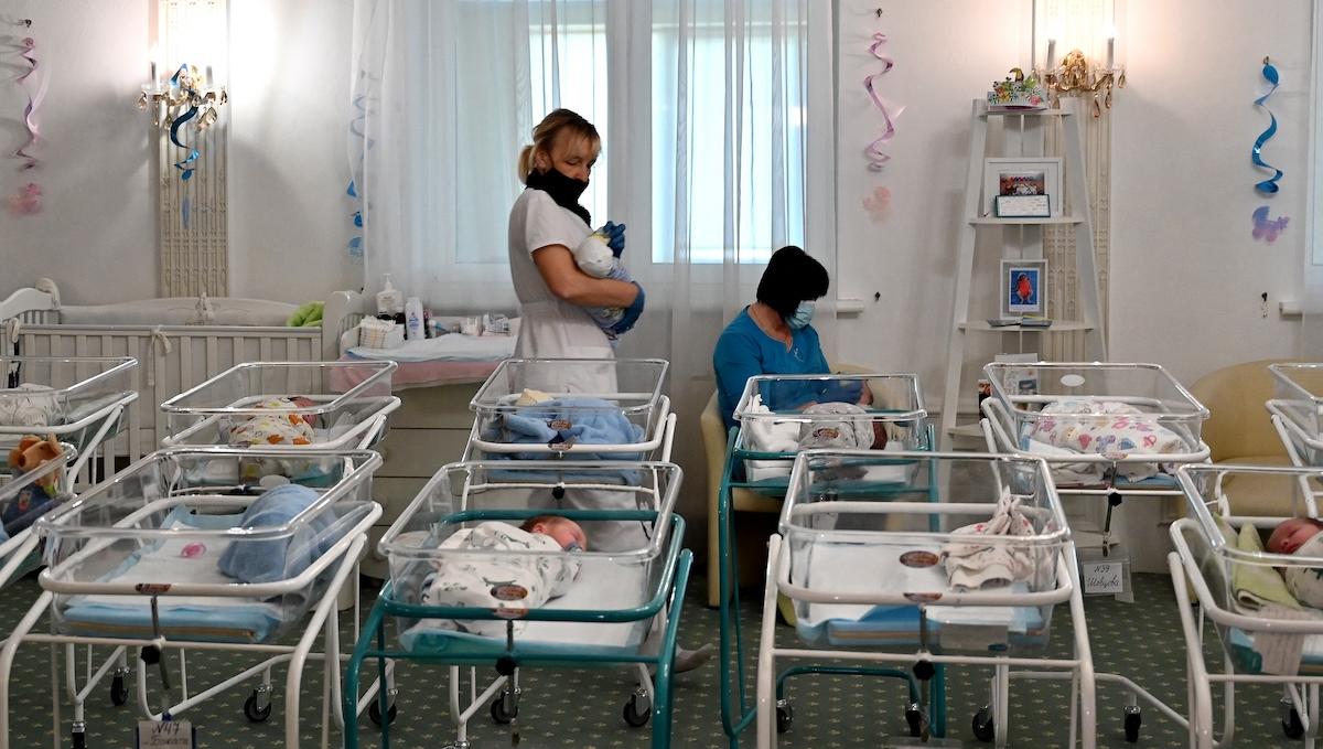 Babies wait to get picked up in Kyiv