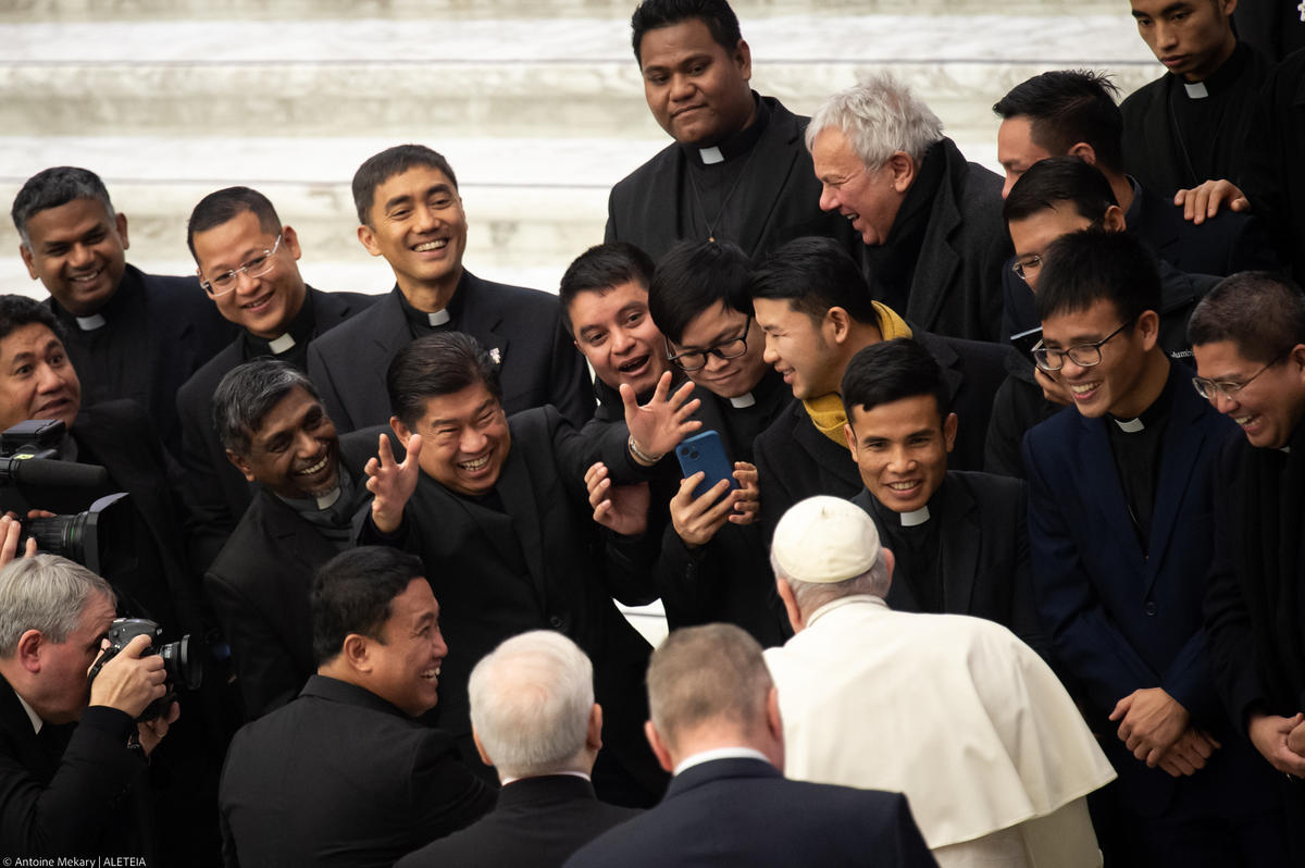 Pope Francis meets with priest at the end of his weekly general audience in Paul VI Hall