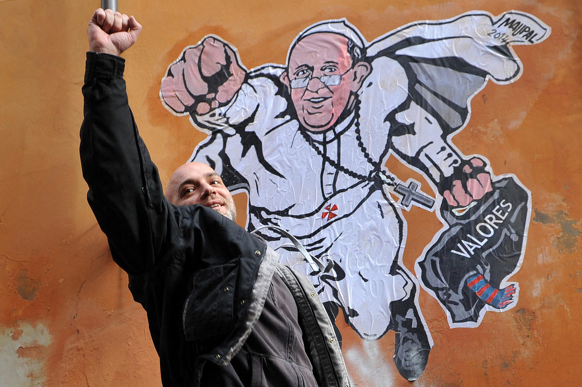 street-art-collage-by-Italian-artist-Maupal-showing-Pope-Francis-AFP