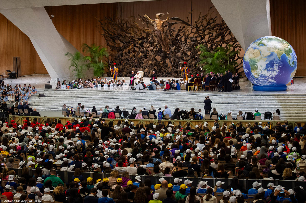 Pope Francis attends a meeting with children from all over the world