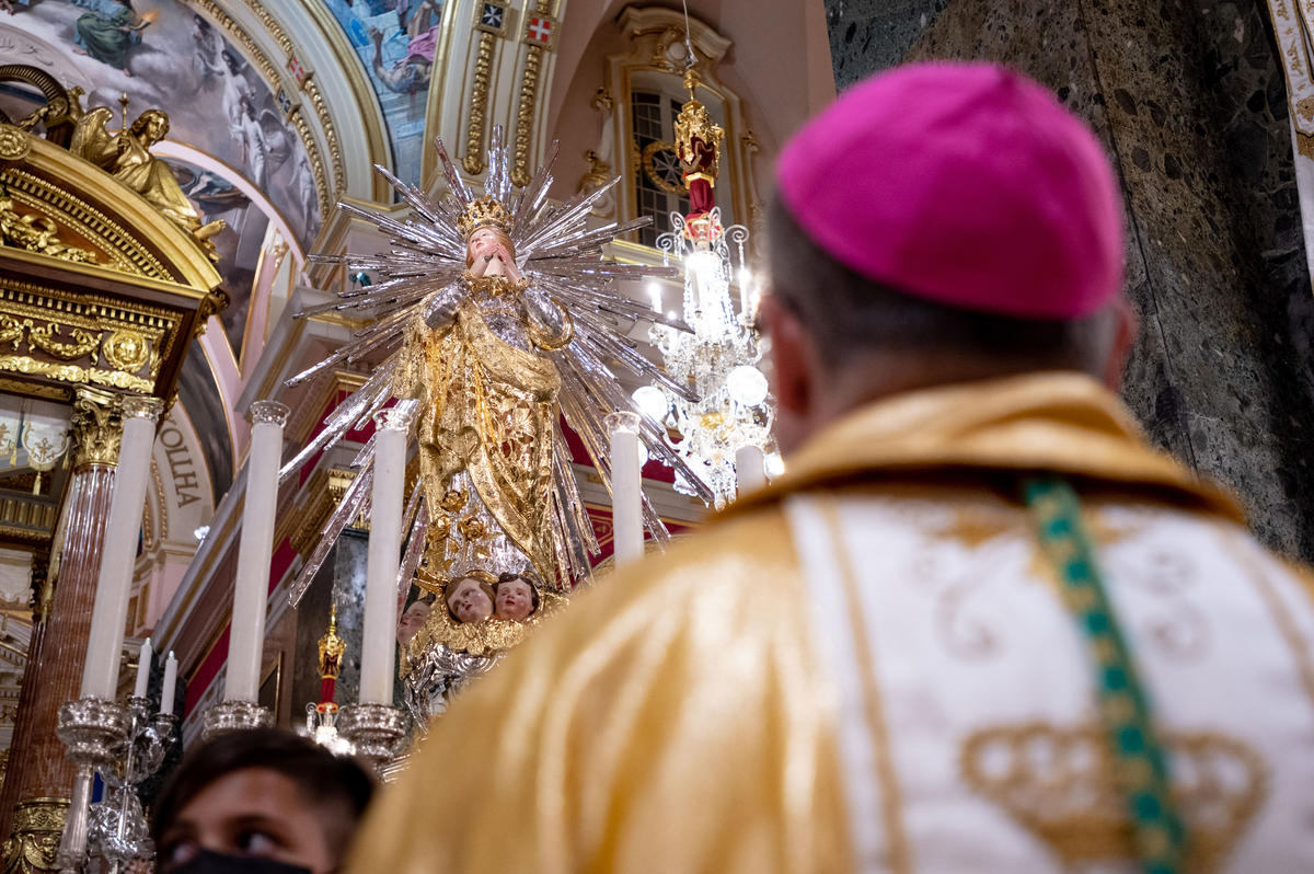 The Archbishop of Malta, His Grace Mgr. Charles Jude Scicluna contemplating before the Bambina, on the 4th of September 2021 - the centenary of the Parish’s elevation to Basilica
