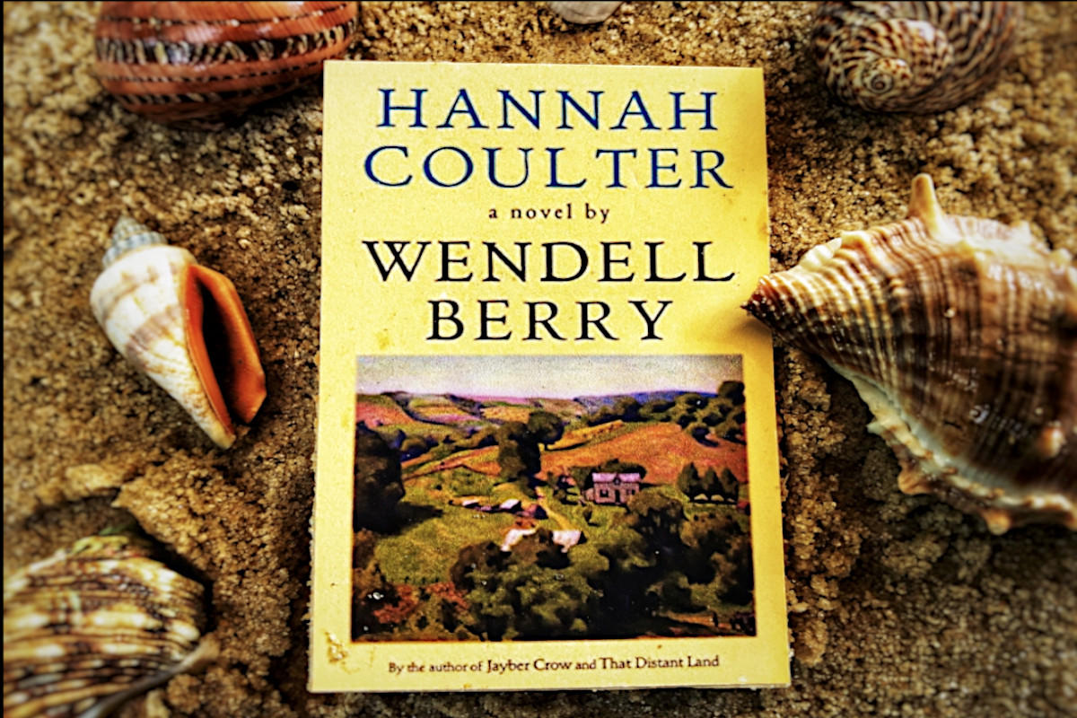 Hannah Coulter by Wendell Berry book on beach.