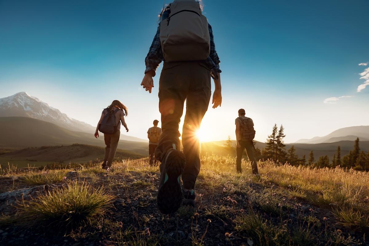 Group of sporty people walks in mountains at sunset with backpacks. Altai mountains, Siberia, Russia. | traveler,dusk,high,mountain,fitness,action,group,exploration,journey,active,hike,girl,friends,adventure,outside,person,vacations,backpacking,silhouette,dawn,trekkers,sunrise,woman,activity,trekking,weekend,back,tourism,endurance,holiday,summer,tourist,backpacker,walking,man,hiker,leisure,together,nature,hiking,team,lifestyle,outdoor,healthy,backpack,sunset,travel,sport,walk