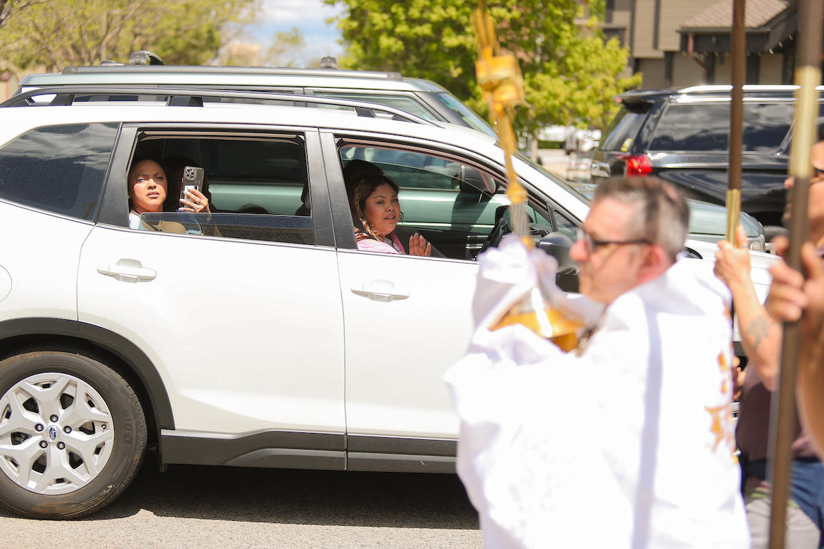 EUCHARISTIC PROCESSION PASSES DRIVERS