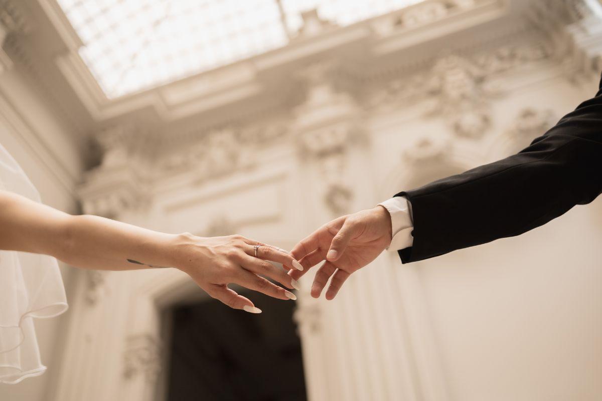bride and groom holding hands- DO NOT REUSE
