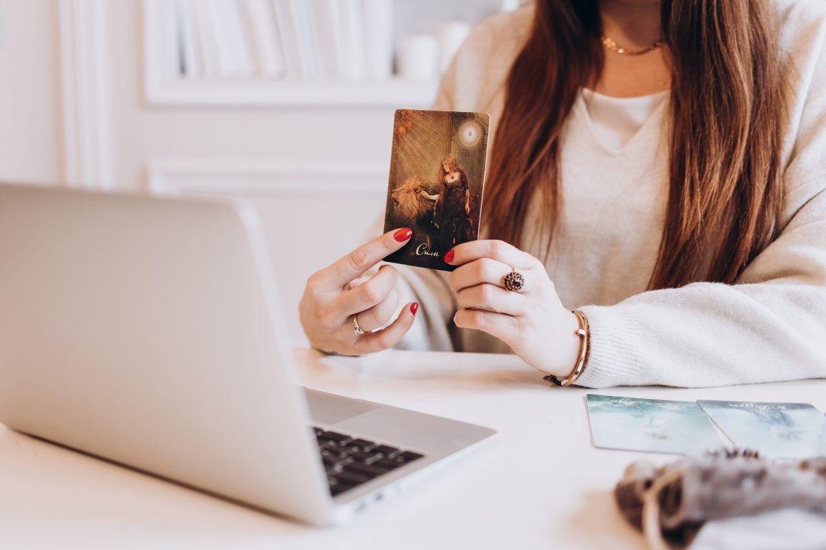 girl playing with tarot cards
