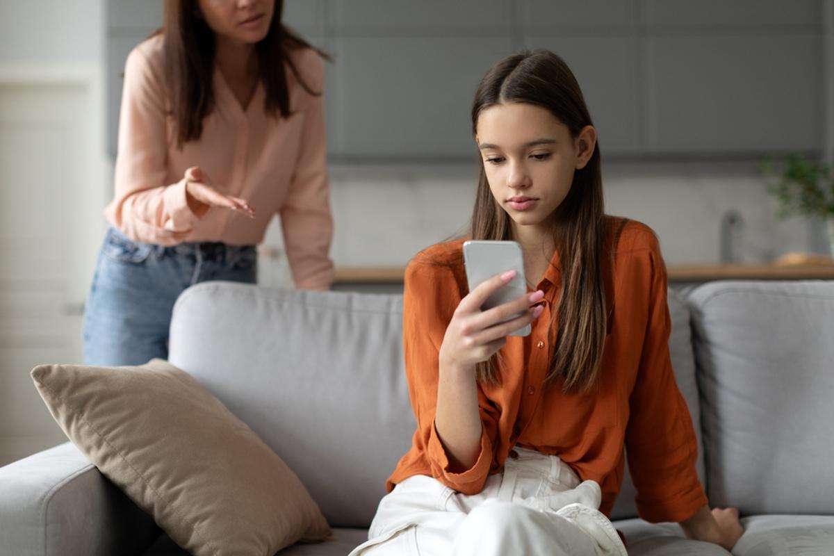 mother arguing with daughter on phone