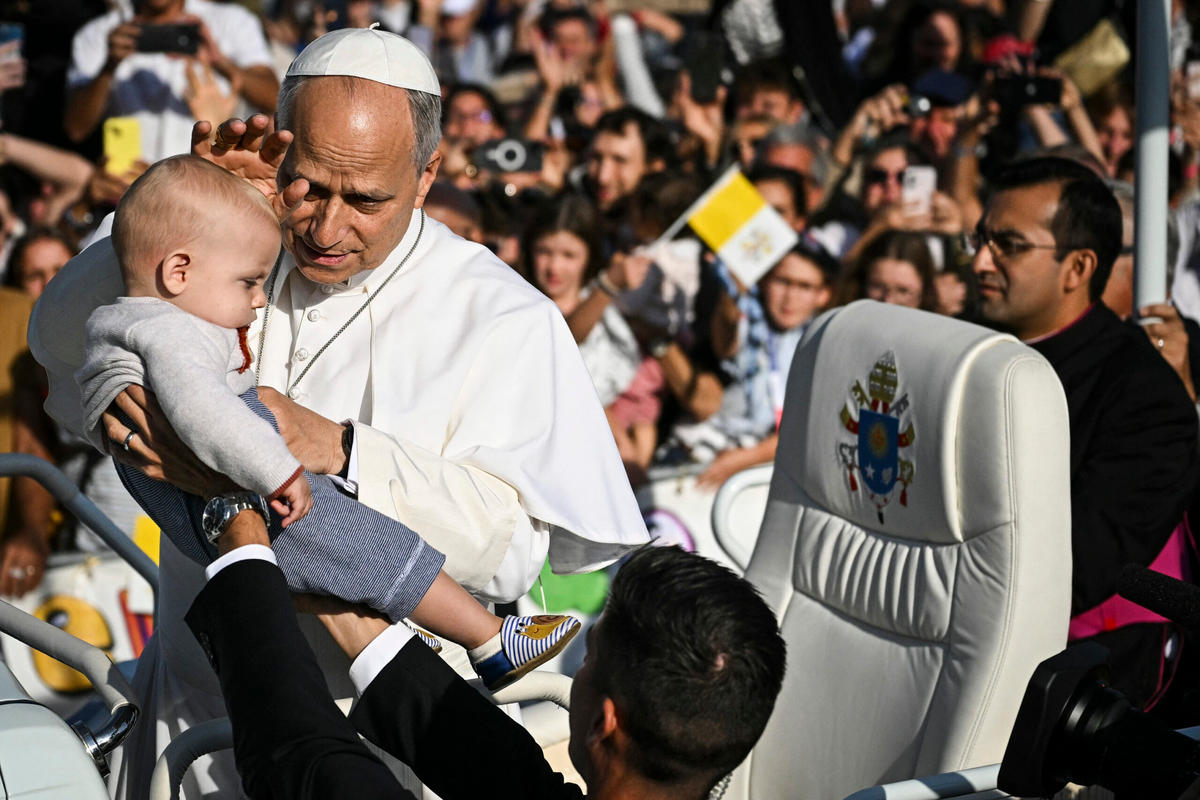 pope-leo-xiv-blesses-child-papamobile-arrives-mass-prairie-shrine-our-lady-lourdes-france-september-27-2026