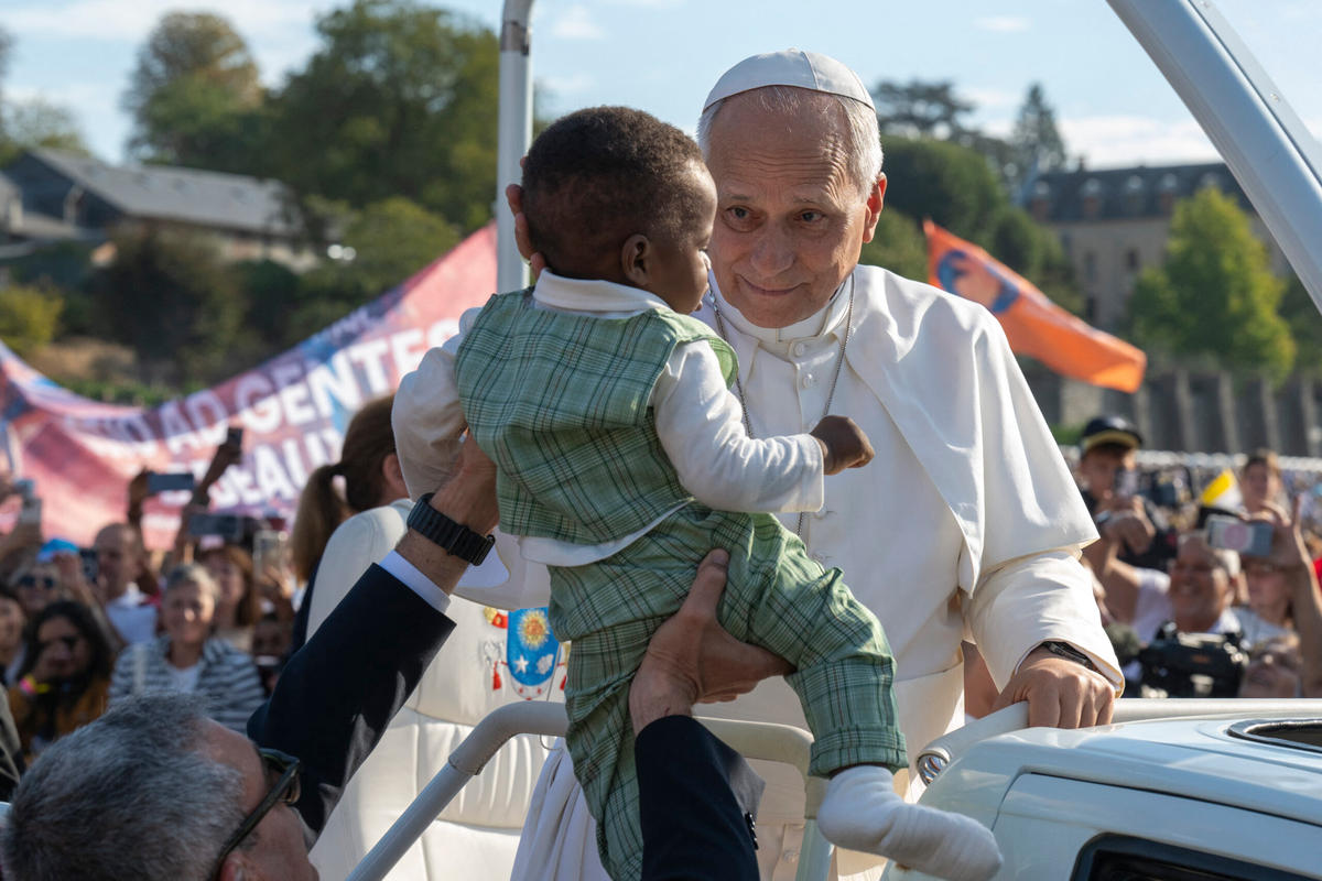 pope-leo-xiv-blesses-child-popemobile-sanctuary-our-lady-lourdes-france-september-27-2026