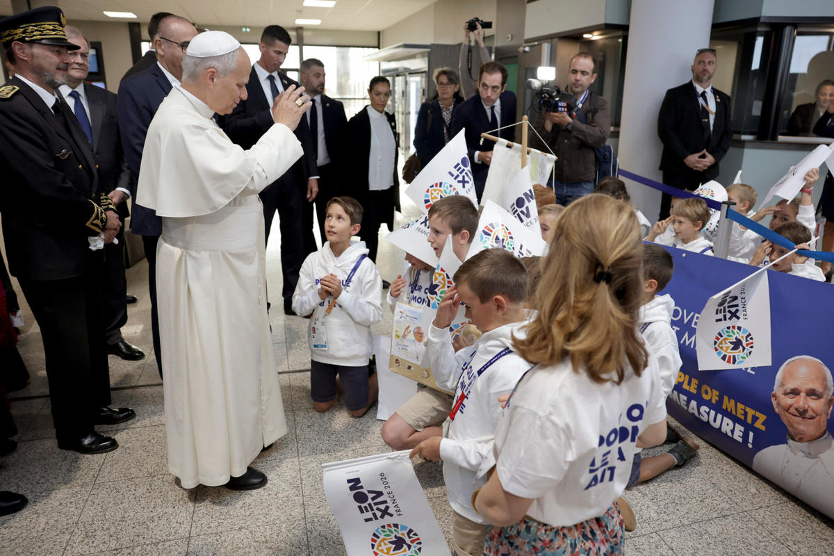 pope-leo-xiv-blesses-children-choir-pascal-bolot-metz-nancy-lorraine-airport-metz-france-september-28-2026