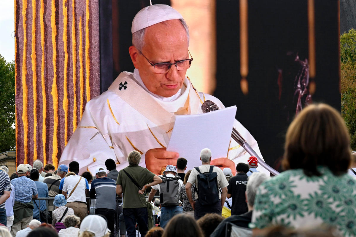 worshippers-watch-giant-screen-pope-leo-xiv-mass-saint-etienne-metz-cathedral-france-september-28-2026