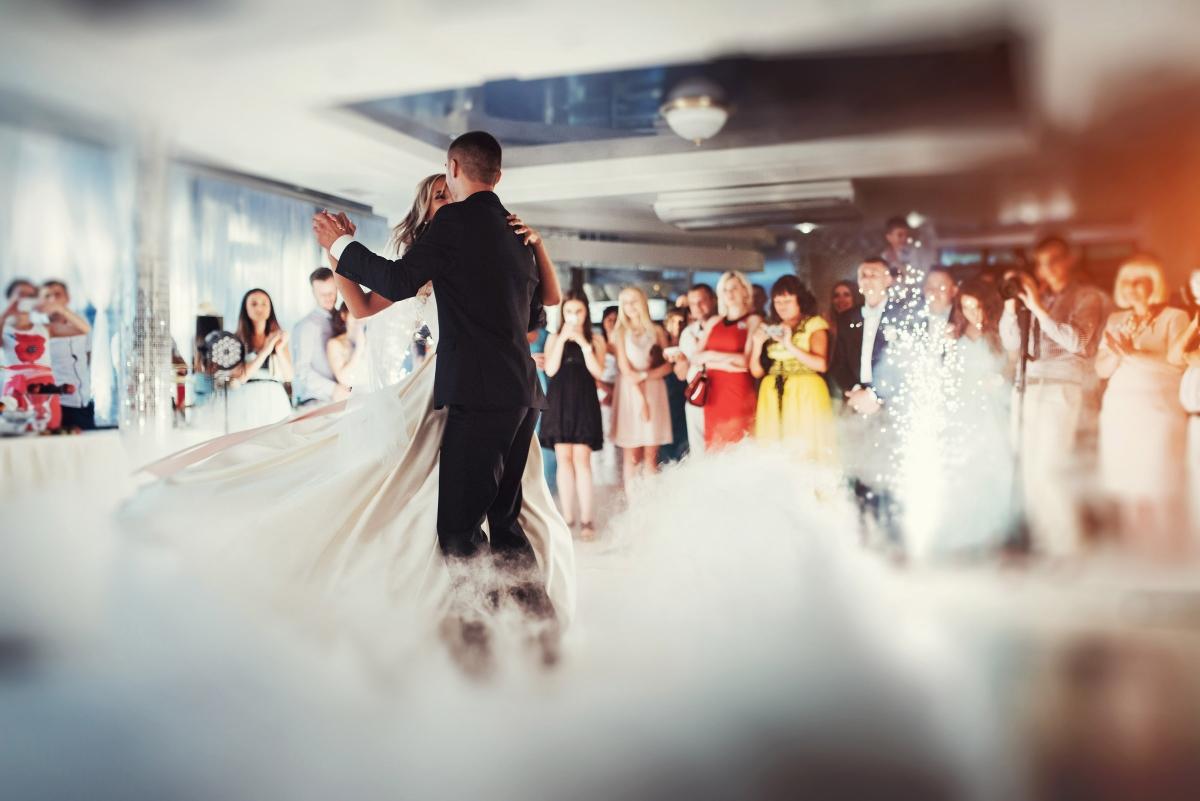 Happy bride and groom and their first dance